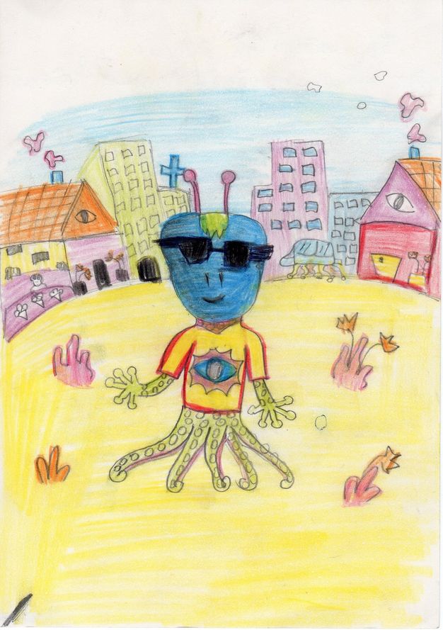 A blue alien with sunglasses and tentacle legs standing in a yellow field in front of houses.