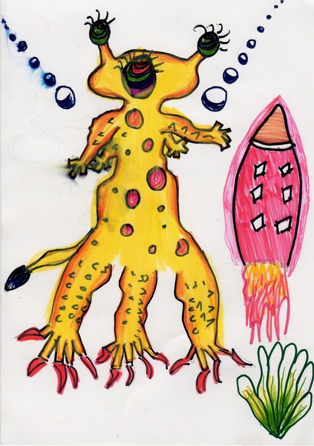 A yellow alien with many eyes and red spots, next to a pink rocket.