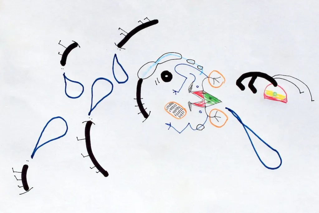 A drawing of thick black arcs, blue teardrop loops and a small face with a red and green mouth.